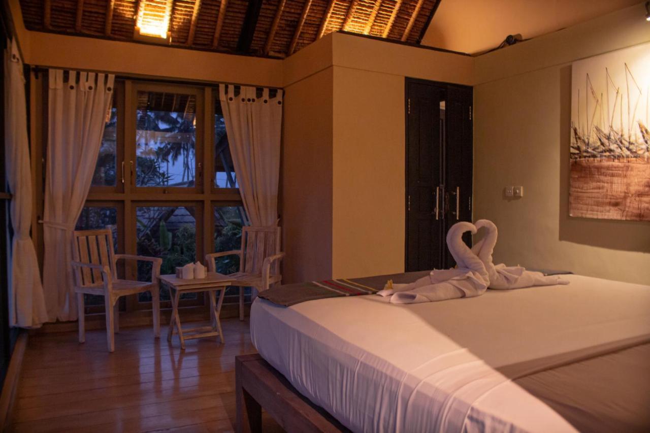 Puri Lotus Hotel Убуд Екстериор снимка